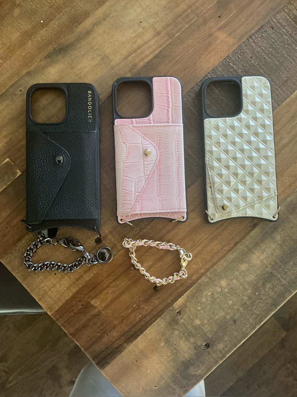 Bandolier Black iPhone 14 Pro Max Case with Gold Logo